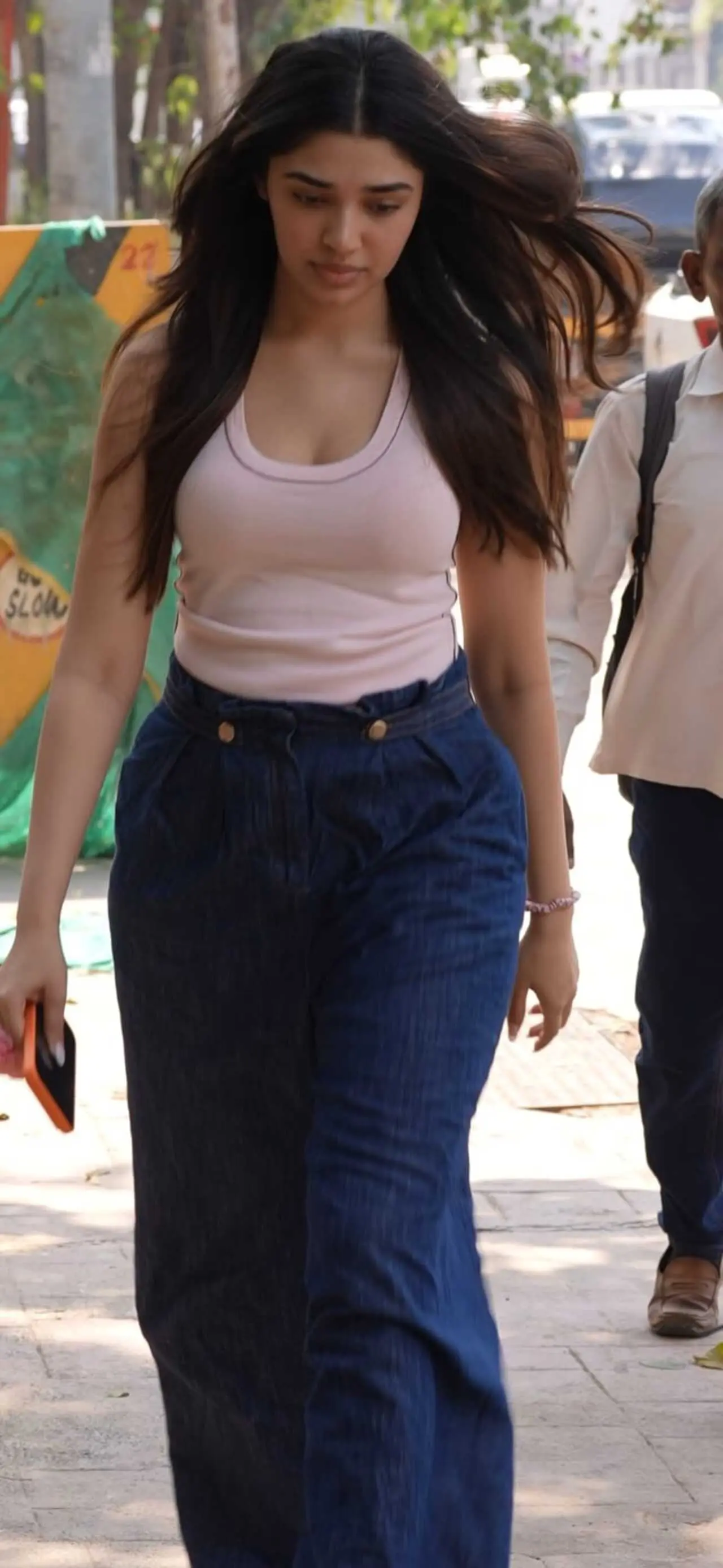 Kriti Shetty was spotted in a casual yet stylish look, wearing a white sleeveless top paired with blue denims.